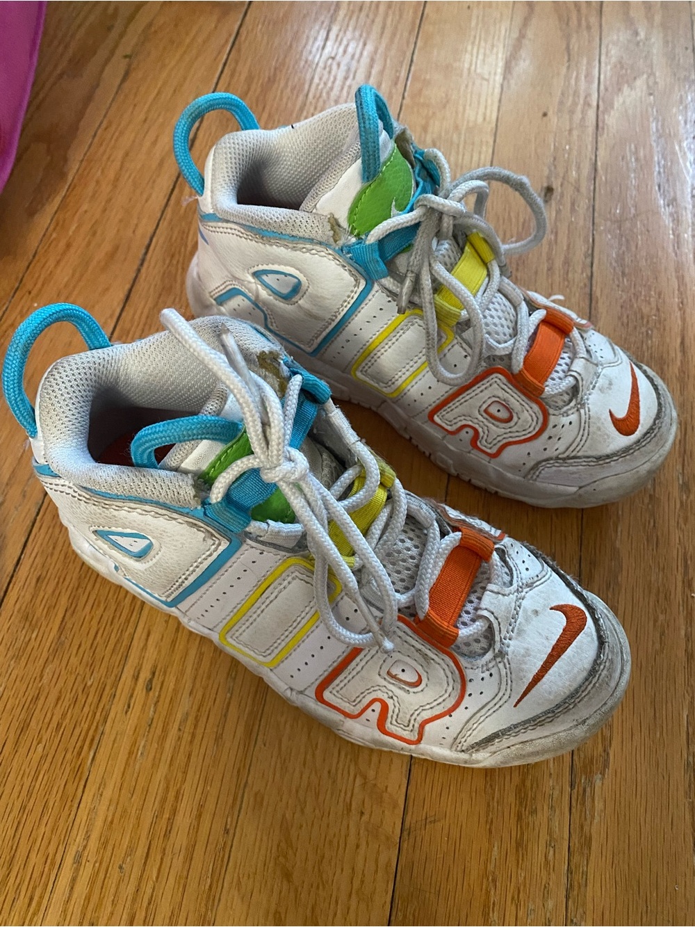 Nike Kids White Sneakers with Blue, Green, Yellow and Orange Accents